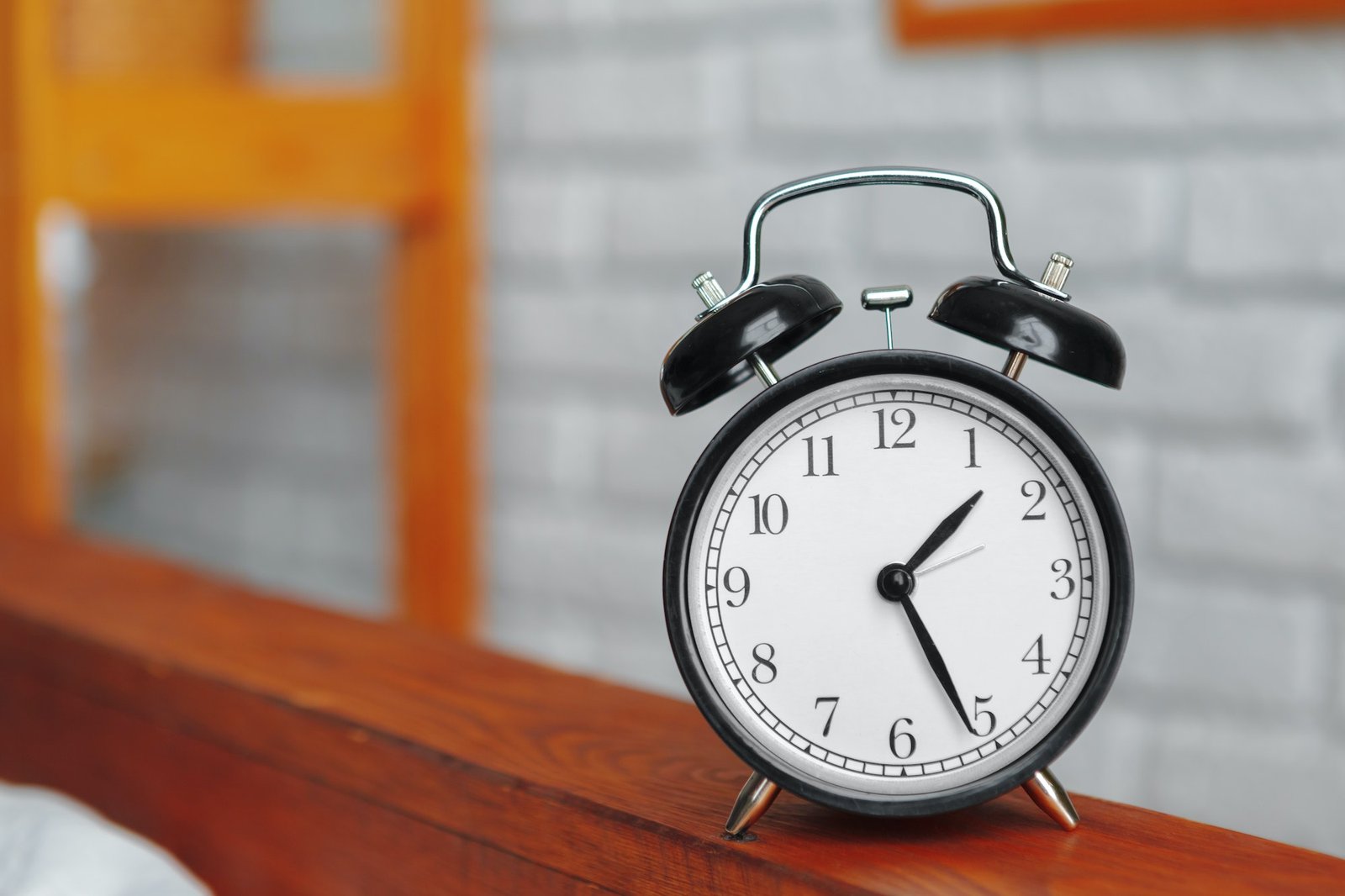 retro alarm clock on table